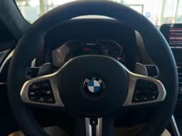 BMW 8 Series M850i Gran Coupe 2026 — side view