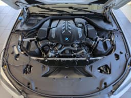 BMW 8 Series M850i Gran Coupe 2026 — side view