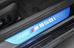 BMW 8 Series M850i Gran Coupe 2026 — side view
