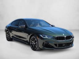 BMW 8 Series M850i Gran Coupe 2026 — side view