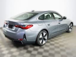 BMW i4 xDrive40 Gran Coupe 2026 — side view