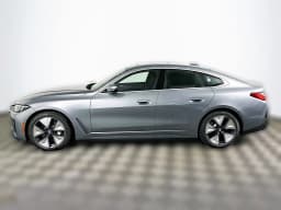 BMW i4 xDrive40 Gran Coupe 2026 — side view