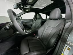 BMW i4 xDrive40 Gran Coupe 2026 — side view