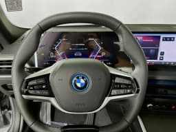BMW i4 xDrive40 Gran Coupe 2026 — side view