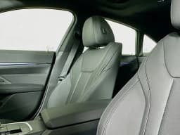 BMW i4 xDrive40 Gran Coupe 2026 — side view