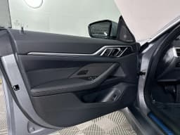 BMW i4 xDrive40 Gran Coupe 2026 — side view