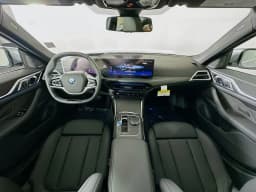 BMW i4 xDrive40 Gran Coupe 2026 — side view