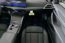 BMW i4 xDrive40 Gran Coupe 2026 — side view