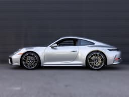 Porsche 911 Carrera Coupe 2026 — side view