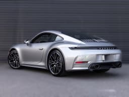 Porsche 911 Carrera Coupe 2026 — side view