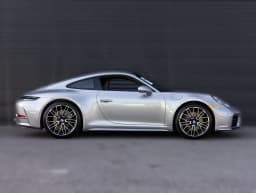 Porsche 911 Carrera Coupe 2026 — side view