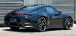 Porsche 911 Carrera Coupe 2026 — side view
