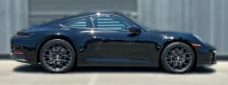 Porsche 911 Carrera Coupe 2026 — side view