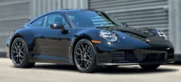 Porsche 911 Carrera Coupe 2026 — side view