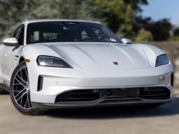 Porsche Taycan 4 AWD 2026 — side view