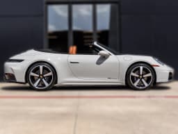 Porsche 911 Carrera Cabriolet 2026 — side view