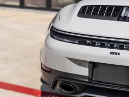Porsche 911 Carrera Cabriolet 2026 — side view