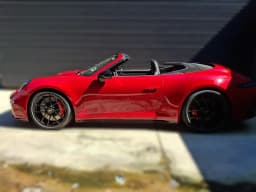 Porsche 911 Carrera 4 GTS Cabriolet 2026 — side view